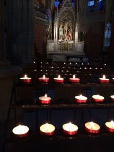 Lighting a candle for Mack in Votivkirche, Wien. (Middle row, first candle.)